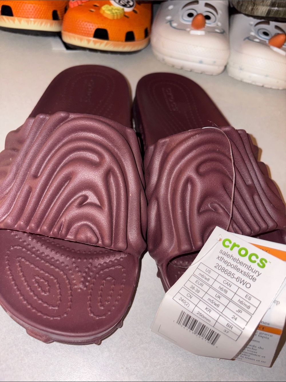 CROCS Wave Slide Sandals in Plum